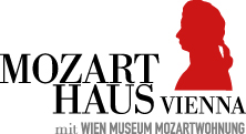 Roter Mozartkopf mit schwarzer Schrift passend zum Mozart Haus Vienna