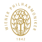 Gold auf weiß ist hier das Emblem der Wiener Philharmoniker zu sehen